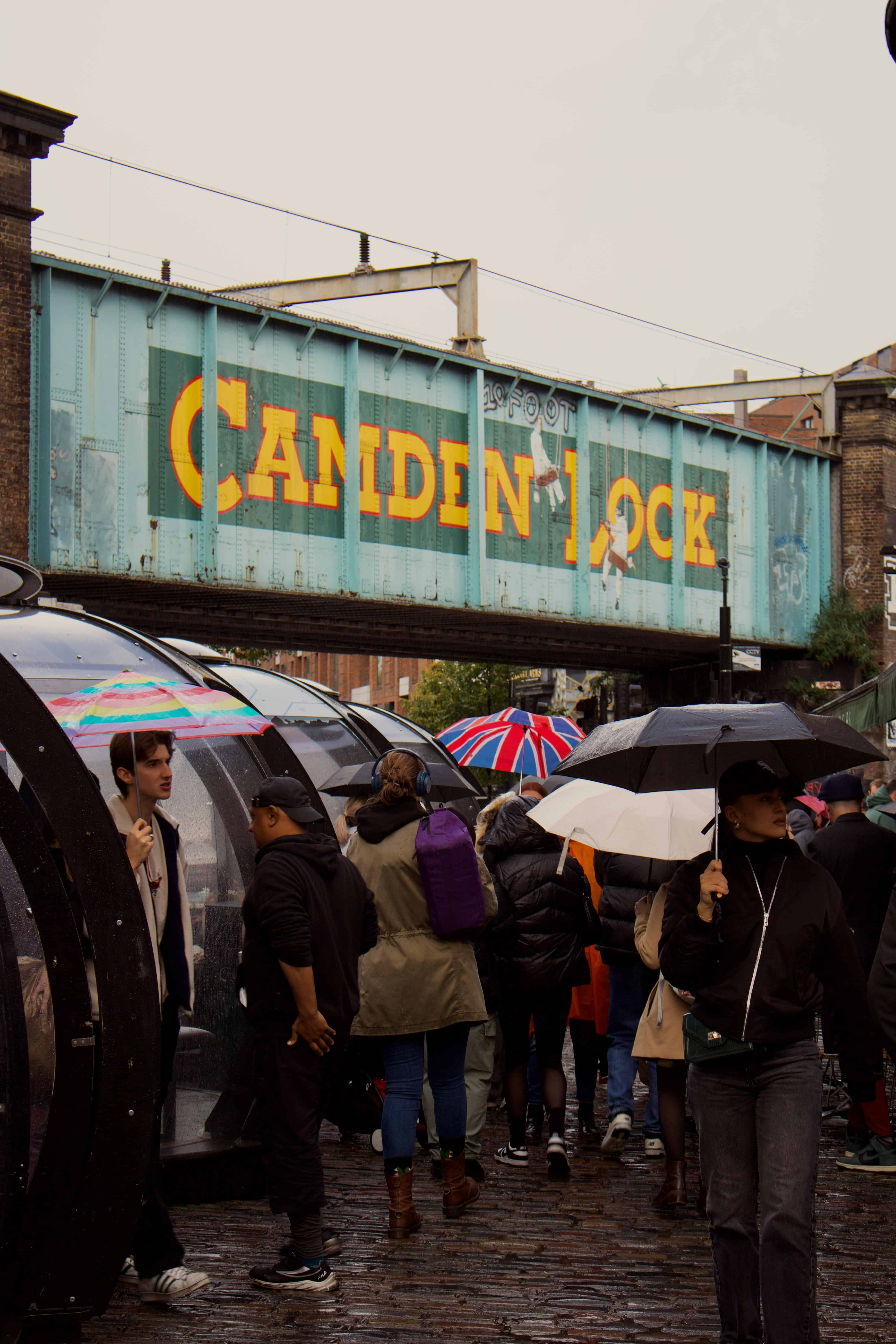 London Camden Lock Rock Festival on a raining day. best places to live in London in your 20s for music.