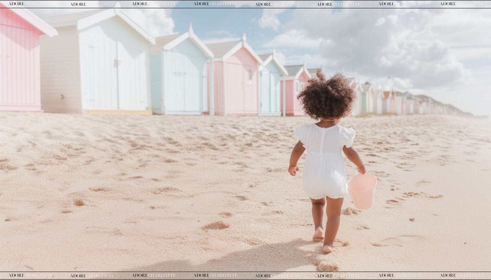 Toddler at the sea front playing.
