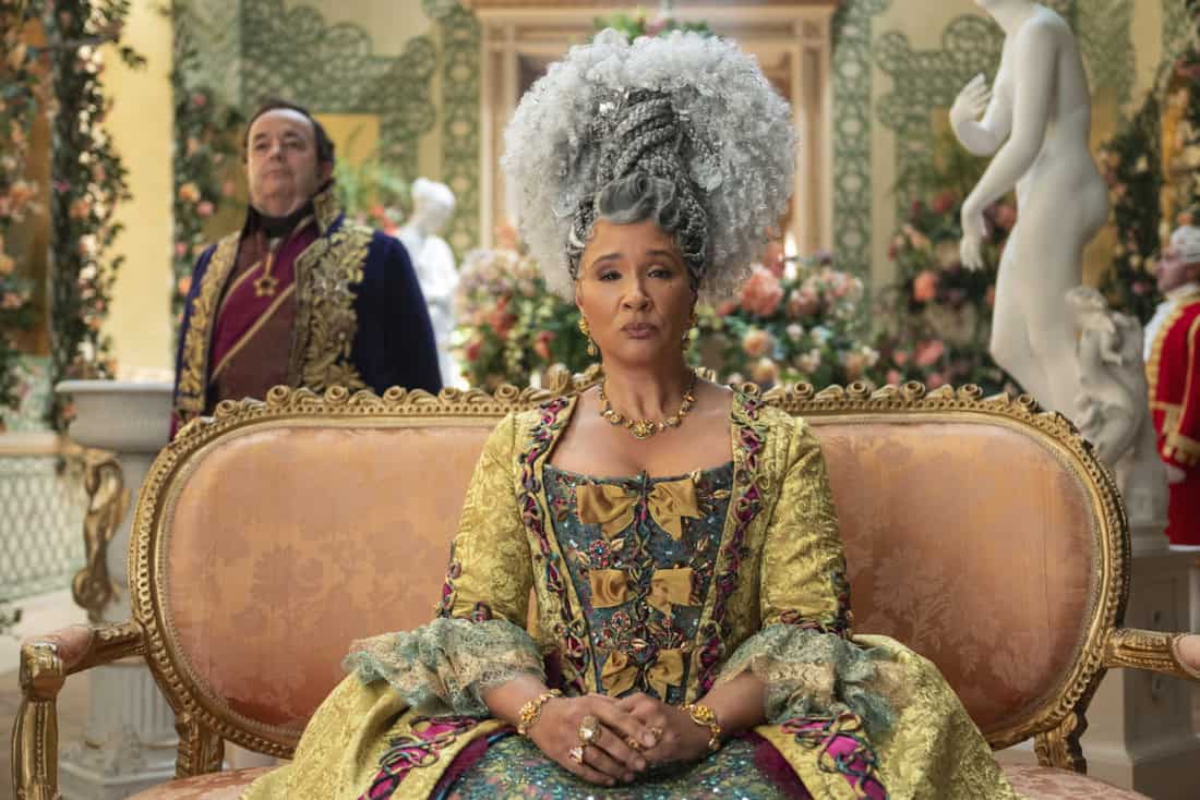 Hugh Sachs as Brimsley and Golda Rosheuvel as Queen Charlotte in Bridgerton Season 4.