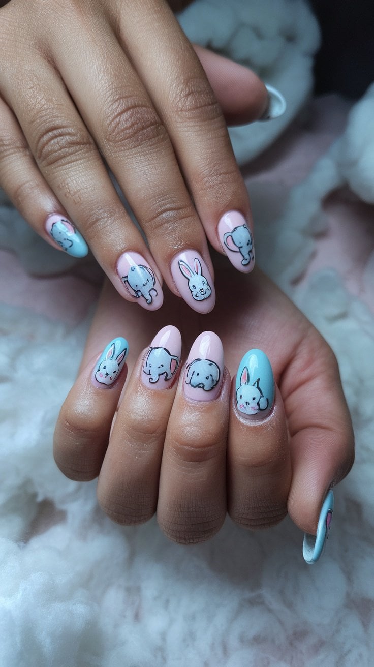 Nail art featuring cute baby animal designs, including bunnies and elephants, on colorful nails